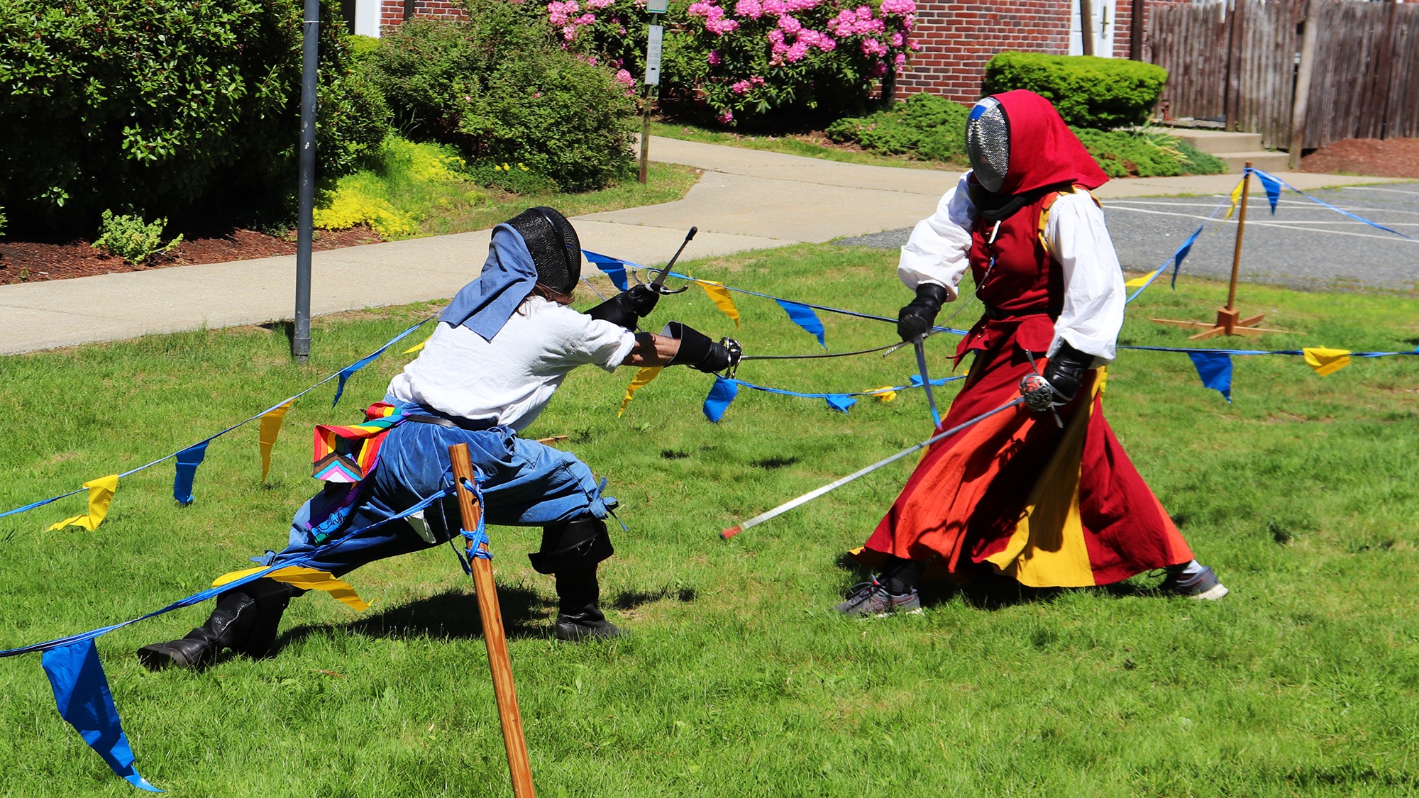Justin fencing with rapier and dagger at a Boston local SCA event