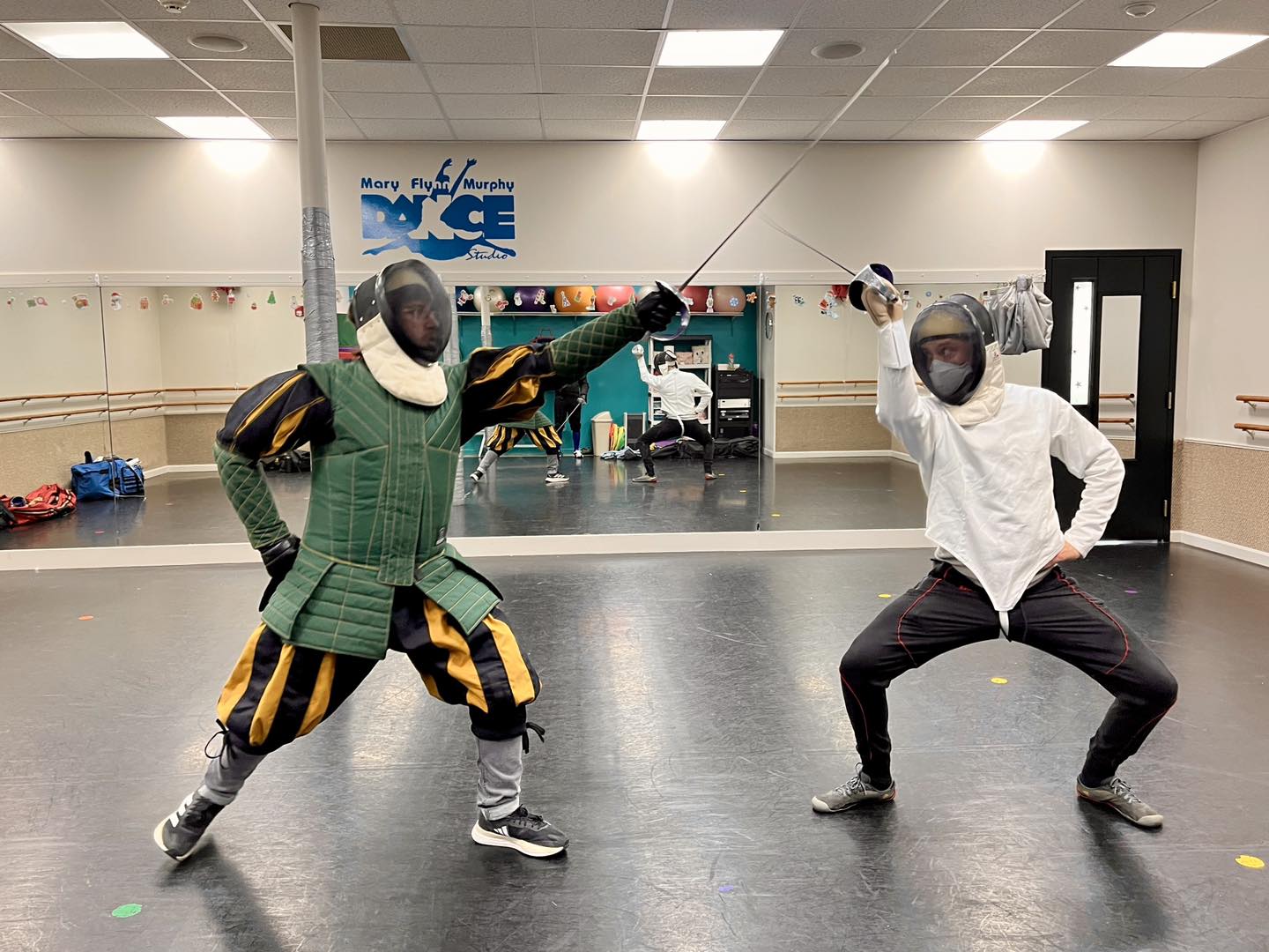 Classical fencing with the Italian dueling saber in Somerville, Massachusetts.