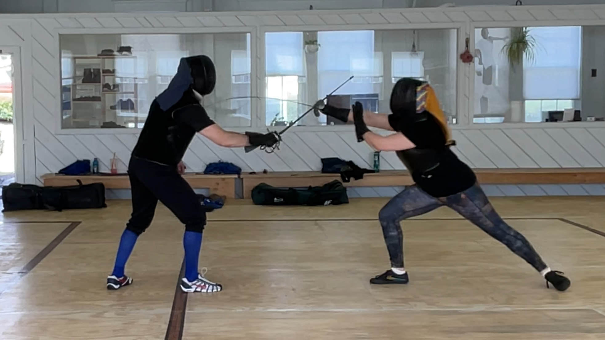 Private fencing lesson screenshot of Yielding Glide of 2nd on the Inside with Italian Rapier