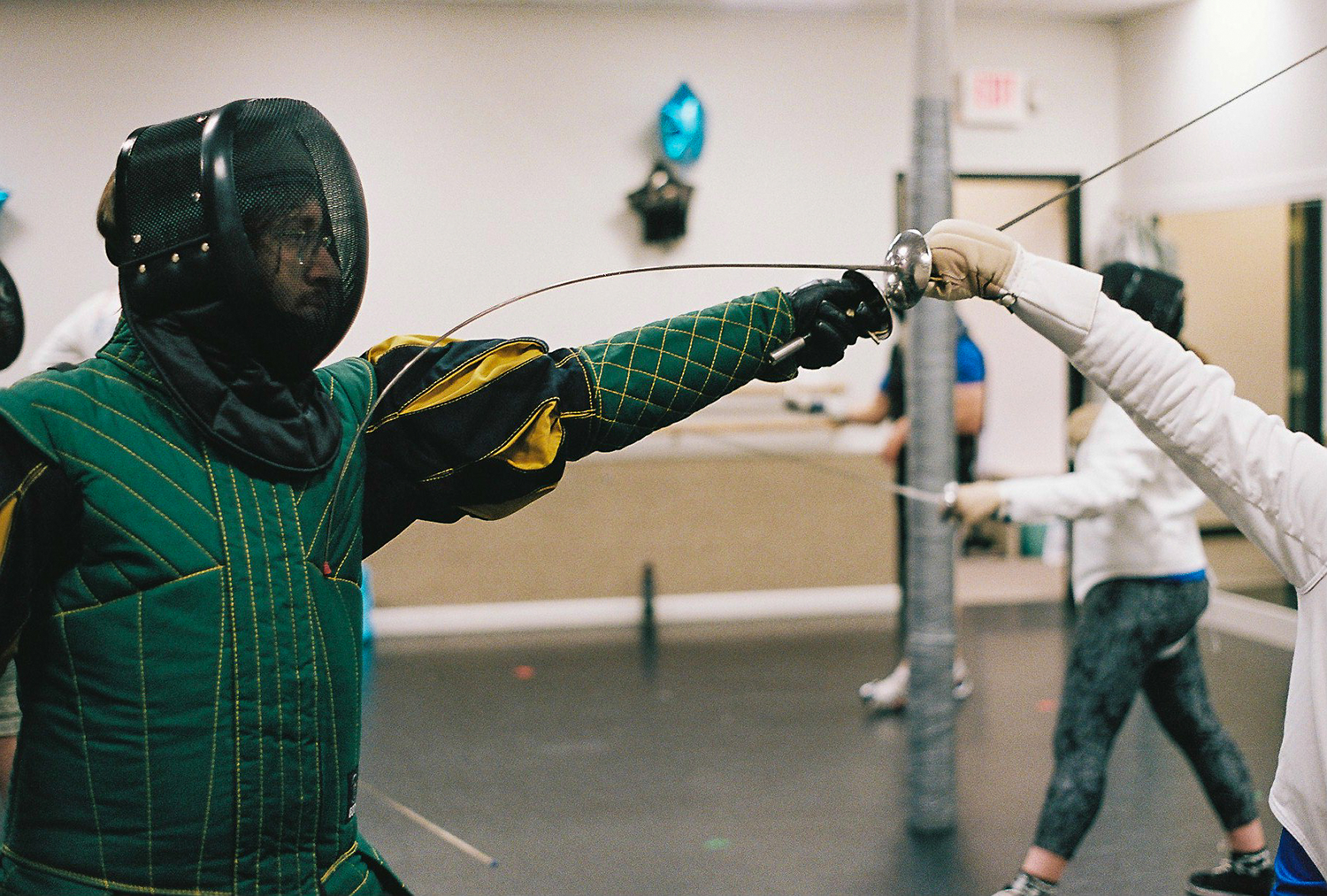 Two classical fencers in Somerville MA work with smallsword